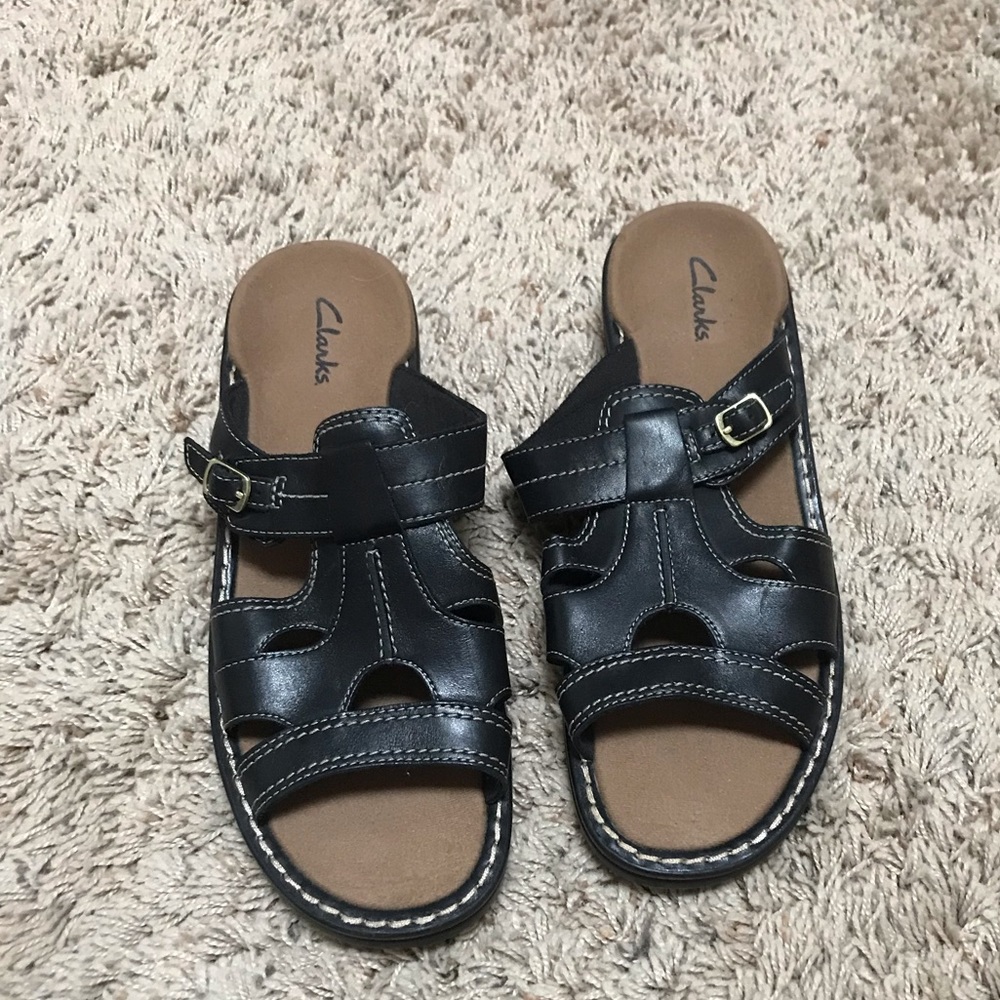 New Clark’s black leather sandals